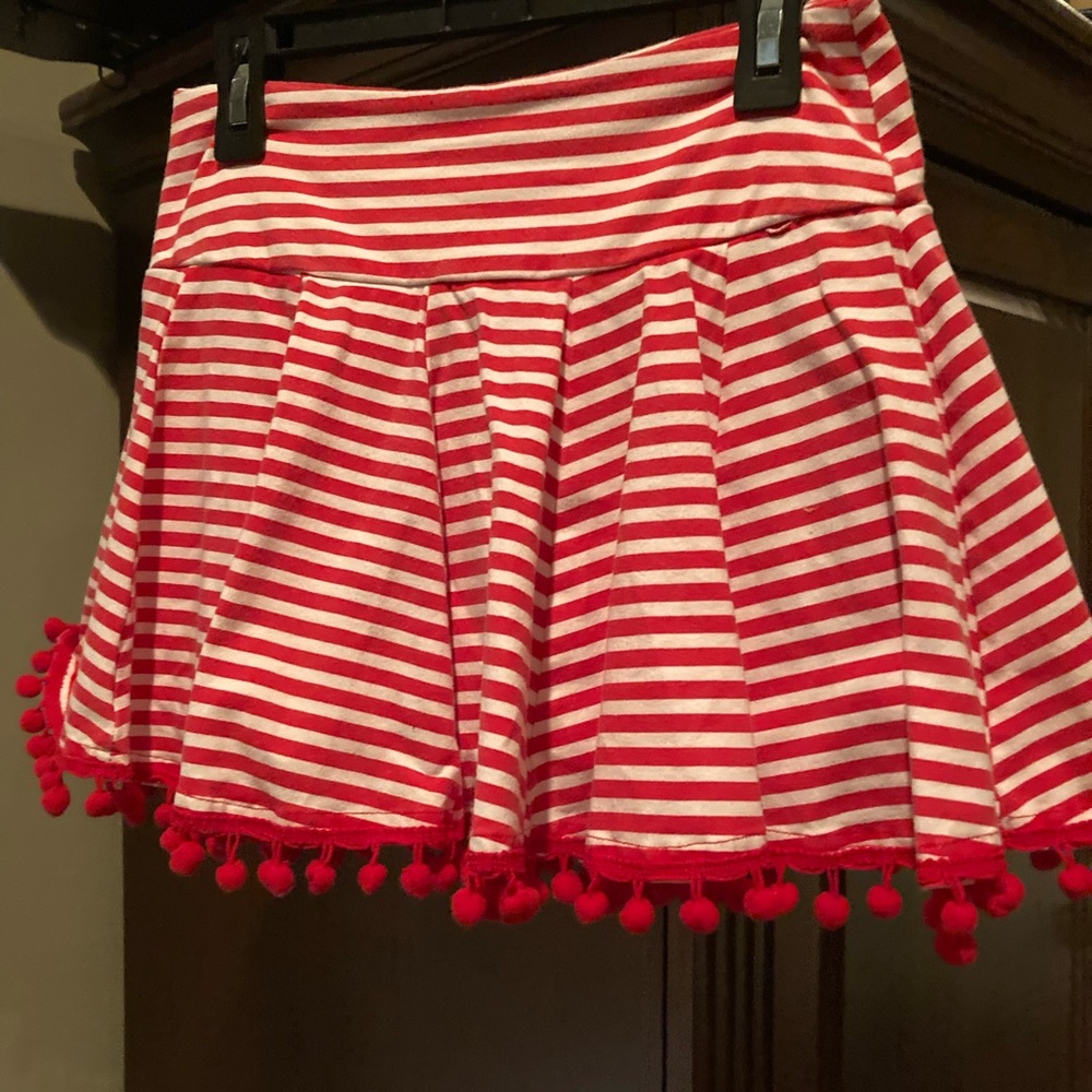 Red and white striped skorts with Pom-Pom detail